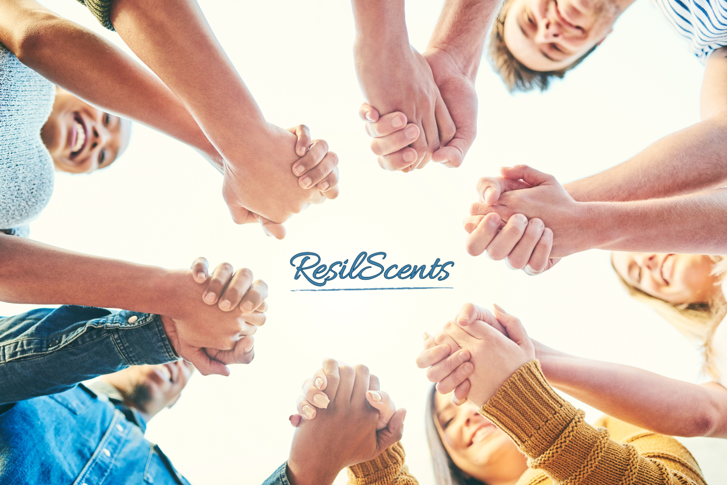 “A group of people holding hands in a circle under bright light with the ResilScents™ logo in the center, representing community, resilience, and positive impact.”