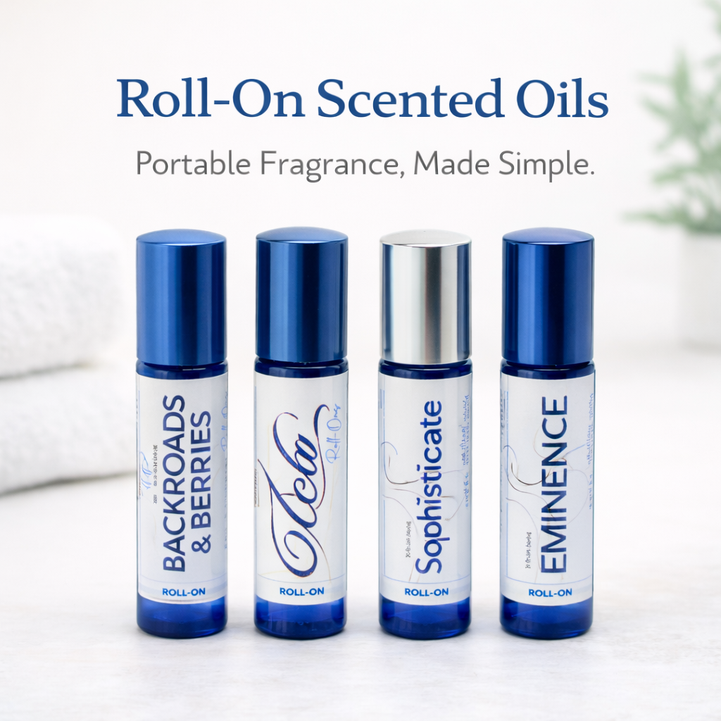 ResilScents™ 10ml roll-on fragrance oils in blue glass bottles with white labels and black caps, handcrafted with grapeseed oil and vitamin E, displayed in multiple signature scents for portable, long-lasting fragrance.